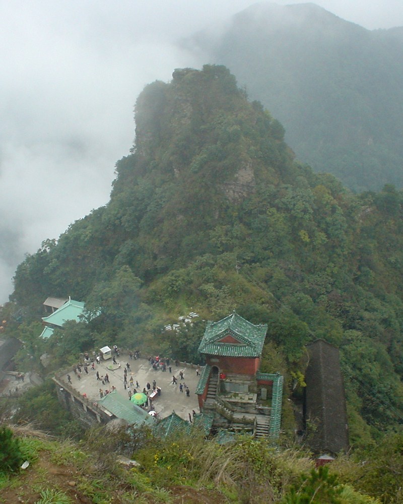 Green-roofed Taoist temples on a forested Wudang ridge