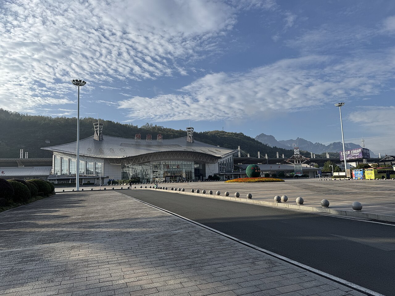 Zhangjiajie Railway Station front plaza, karst peaks behind